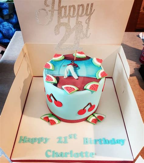 A Birthday Cake In A Box With The Number Twenty On It And Watermelon Slices