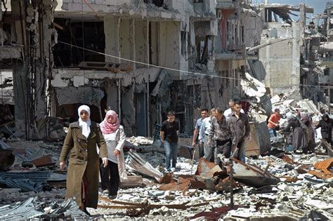 Days After Cease Fire Homs Residents Return To Sift Through Homes