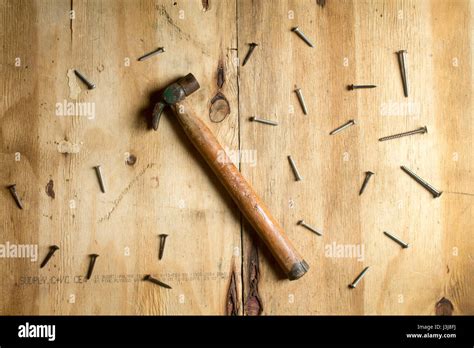 Hammer And Screws On Wooden Background Stock Photo Alamy