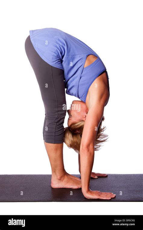 Beautiful Healthy Woman Doing Standing Forward Fold Uttanasana