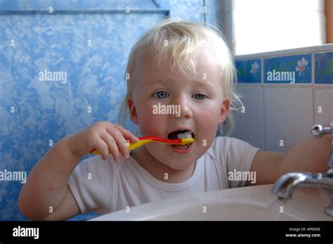 Brushing Teeth Tap Hi Res Stock Photography And Images Alamy