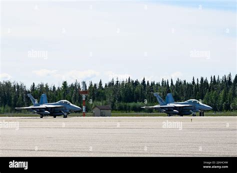 Two Royal Australian Air Force Fa 18f Super Hornets Sit On The