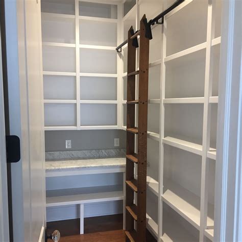 Pantry With Ceilings Marble Workstation And Library Ladder To