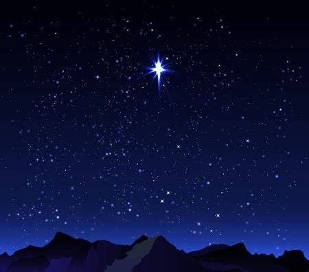 A Night Sky With Stars And Mountains In The Foreground As Well As A