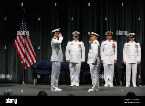 Cmdr Emil Dinnocenzo Left Relieves Cmdr Larry Arbuckle During A