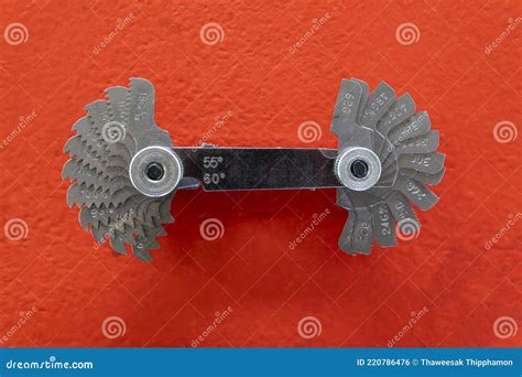 Thread Pitch Gauge or Pitch Gauge on Orange Background Stock Photo ...