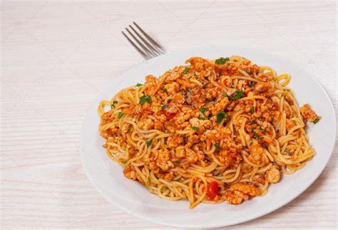 Capellini pasta with tomato and meat sauce — Stock Photo © semenovp ...