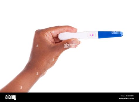 Black Woman Hand Holding A Positive Pregnancy Test African People