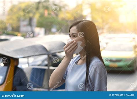 Asian Woman Is Wearing Protection Mask In Order To Protect Bad Air