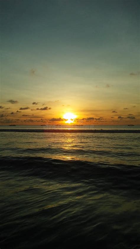 Sunset On Kuta Beach In Bali Indonesia Stock Photo Image Of Beach