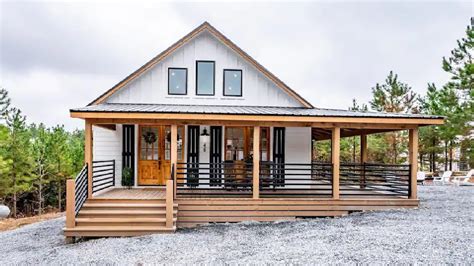 Modern Farmhouse With Spacious Wrap Around Deck Amidst Peaceful