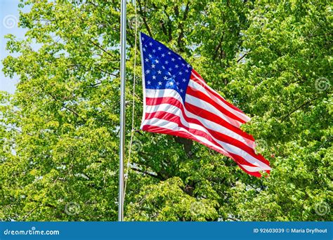 American flag at half mast stock image. Image of pole - 92603039