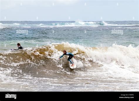 Surfers Off The Coast Of Margaret River In Western Australia Stock