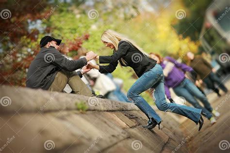 Man Helping Woman Stock Photo Image Of Couple Bokeh 10700494