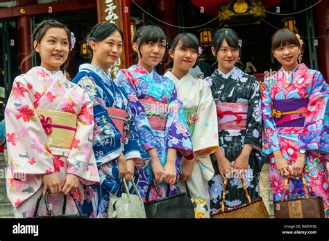 Young Japanese Women Wearing A Traditional Dress Called Kimono At Senso