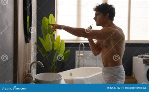 Goofy Naked Man Fooling Around Rolling His Eyes Exposing Tongue Stock Photography