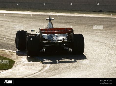 Formula Racecar Speeds Through Curve Jan Stock Photo Alamy