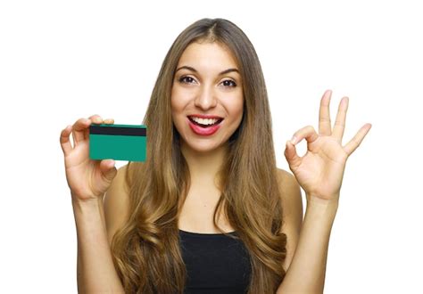 Premium Photo Portrait Of Happy Young Woman Holding Credit Card