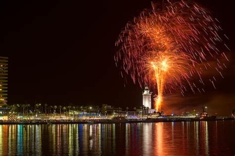 Premium Photo | Fireworks at the ceremonial opening of feria de malaga ...