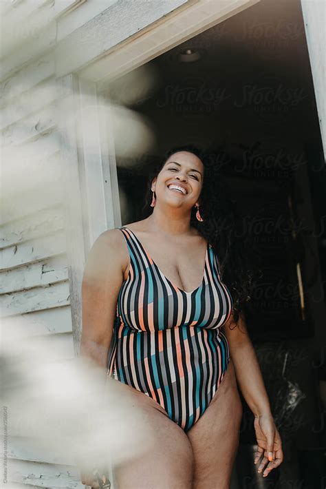 A Plus Size Model Wearing A Bathing Suit In The Summer By Stocksy