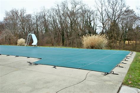 Caring For Your Pool Cover This Winter Caribbean Pools Pool Closing