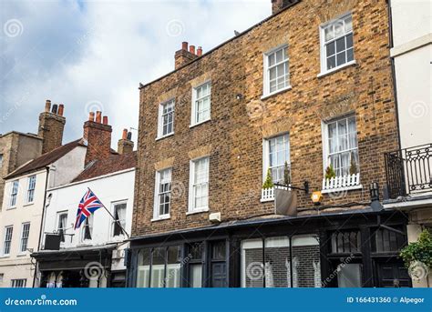 Traditional British Apartment Buildings Along A Street In A Town Centre