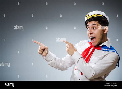 Funny captain sailor wearing hat Stock Photo - Alamy