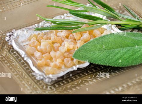 Frankincense And Golden Bowl With Herbs Stock Photo Alamy