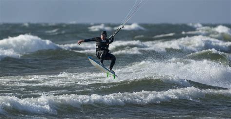 High Lake Michigan waves delight surfers, strong winds knock out power - mlive.com