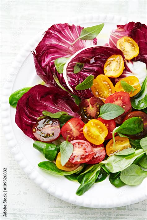 Cherry Tomato, Chicory and Corn Lettuce Salad Stock Photo | Adobe Stock