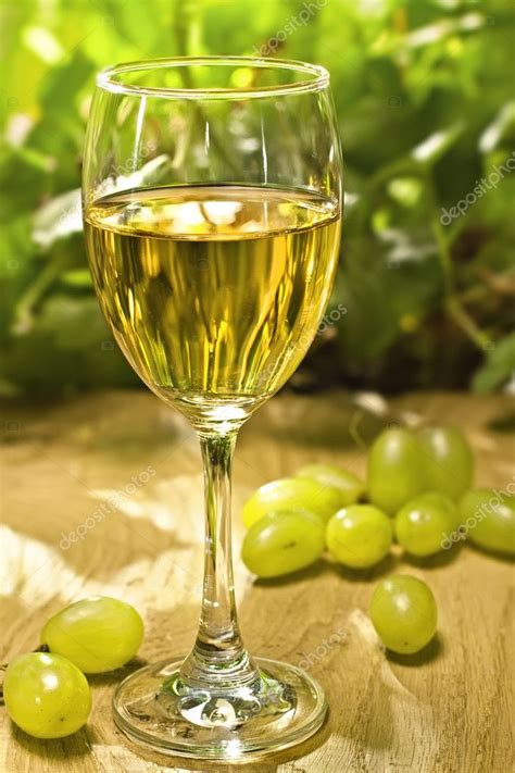 White Wine Glass On The Table — Stock Photo © Derkien 10933814