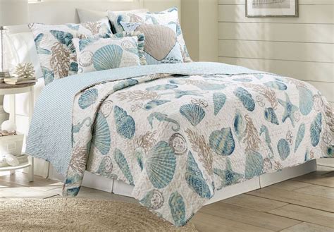 This Quilt Set Features A Coastal Sea Shell Seahorse And Coral Design