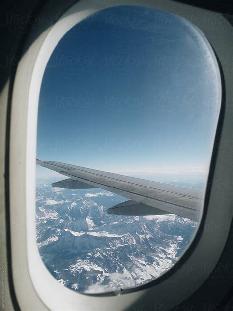 "Oval Aircraft Window View To Alpes" by Stocksy Contributor "Anna ...