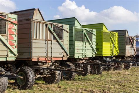 Agricultural Trailers Parked on the Side of the Farm in Country Side Village. Trailers Stock ...