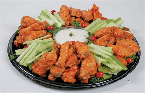 Buffalo Wing Party Platter with Celery - Prepared Food Photos, Inc.