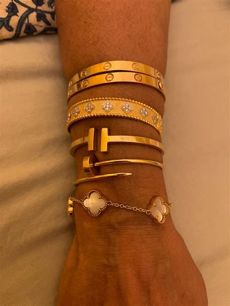 Stacked Cartier love bracelets VC A Perlée Tiffany Cartier Juste en