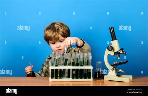 Little Boy Scientist In Laboratory Educational Experiment Learning