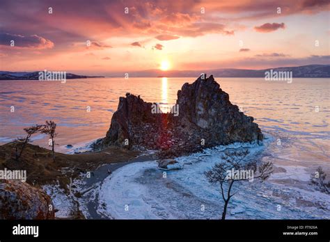 Sunset above frozen surface of the lake Baikal Stock Photo - Alamy