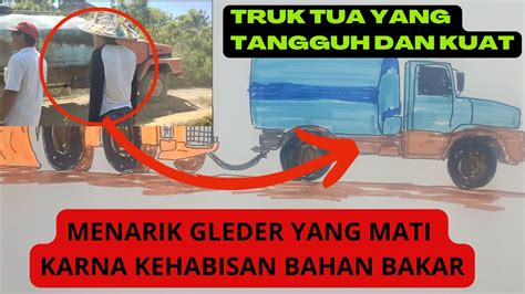 SANGAR KUAT DAN TANGGUH TRUK JADUL MENARIK GLEDER MOGOK DI TENGAH