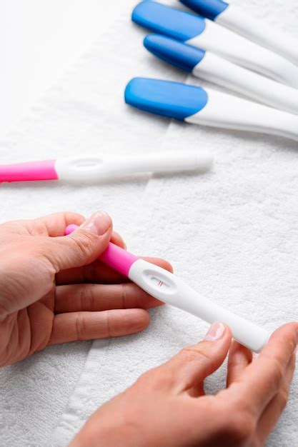 Free Photo Hands Holding Positive Pregnancy Test