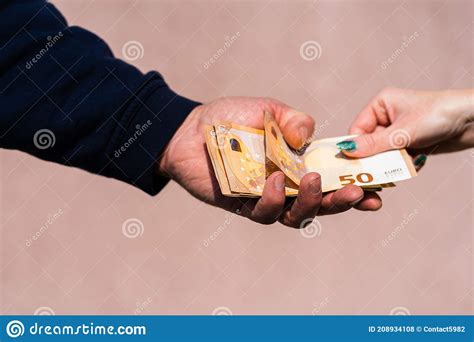 Hand Giving Money Like Bribe Or Tips Or Salary Isolated Hard Worked