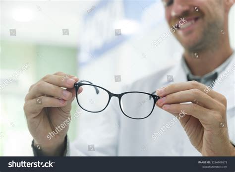 Professional Optician Suggest Clients Trying Choosing Stock Photo