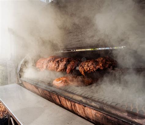 Large Barbecue Smoker Grill At The Park Meat Prepared In Barbecue