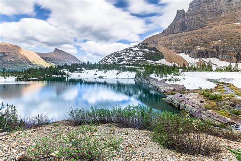 Watching As Time Goes By Iceberg Lake Photograph By Garth Steger