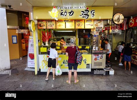 Singapore / Singapore - February 15, 2019: Local people in front of ...