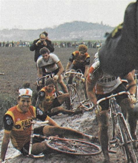 A Group Of Men Riding Bikes On Top Of A Dirt Field Next To Each Other