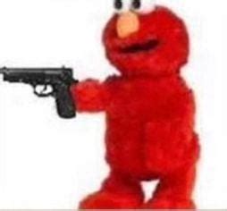 Elmo has got a gun : r/Elmo_rojo