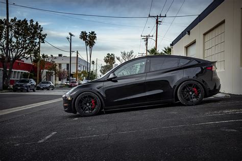 Solid Black Tesla Model Y Dual Motor Performance UP X BBS Flugplatz