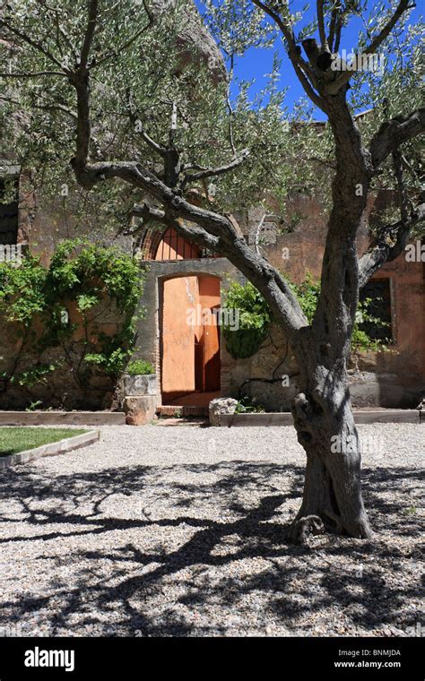 View Of Santa Cova Chapel On Montserrat Serrated Mountain West Of