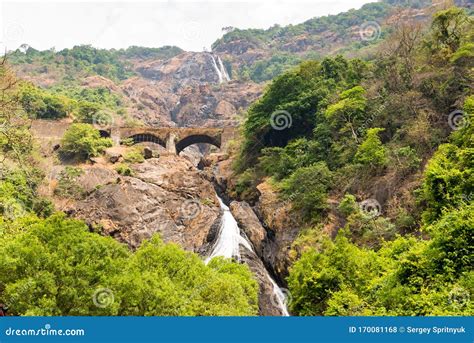 Incredible View of Dudhsagar Waterfall with Railway Bridge in Goa / India Stock Photo - Image of ...